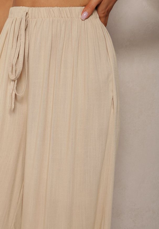 Renee - Beżowe Szerokie Spodnie High Waist z Gumką w Talii Ilnena. Okazja: na co dzień. Stan: podwyższony. Kolor: beżowy. Styl: klasyczny, elegancki, casual