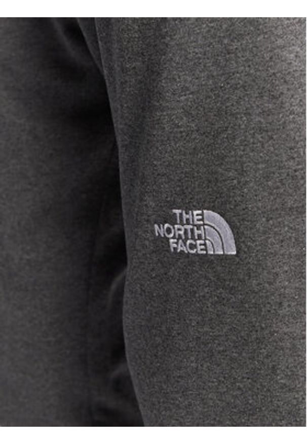 The North Face Spodnie dresowe Nse Light NF0A4T1F Szary Regular Fit. Kolor: szary. Materiał: syntetyk, bawełna