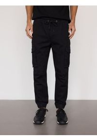 Reserved - Spodnie cargo jogger - czarny. Kolor: czarny. Materiał: bawełna