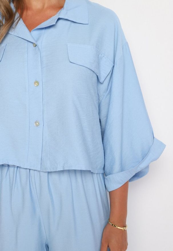 Born2be - Jasnoniebieski Komplet Dwuczęściowy z Wiskozy Koszula z Guzikami Spodnie z Gumką w Talii Vimarenes. Kolor: niebieski. Materiał: wiskoza