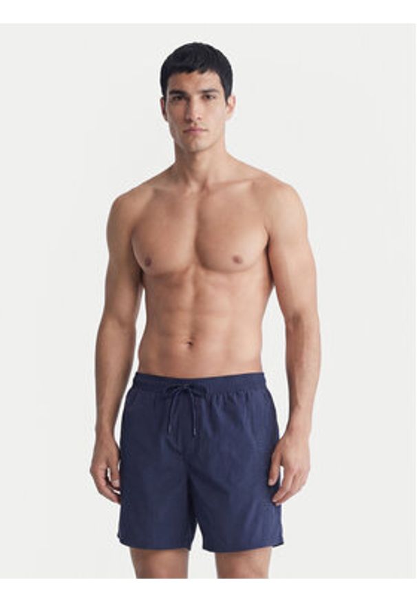 Calvin Klein Swimwear Szorty kąpielowe LV00N61029 Granatowy Regular Fit. Kolor: niebieski. Materiał: syntetyk