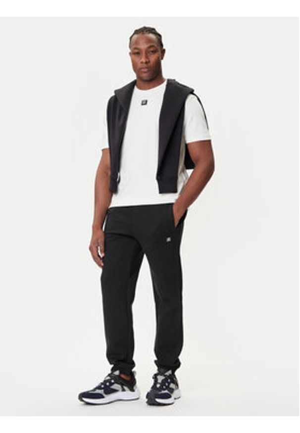 Hugo - HUGO Spodnie dresowe Dimacs 50533695 Czarny Relaxed Fit. Kolor: czarny. Materiał: bawełna