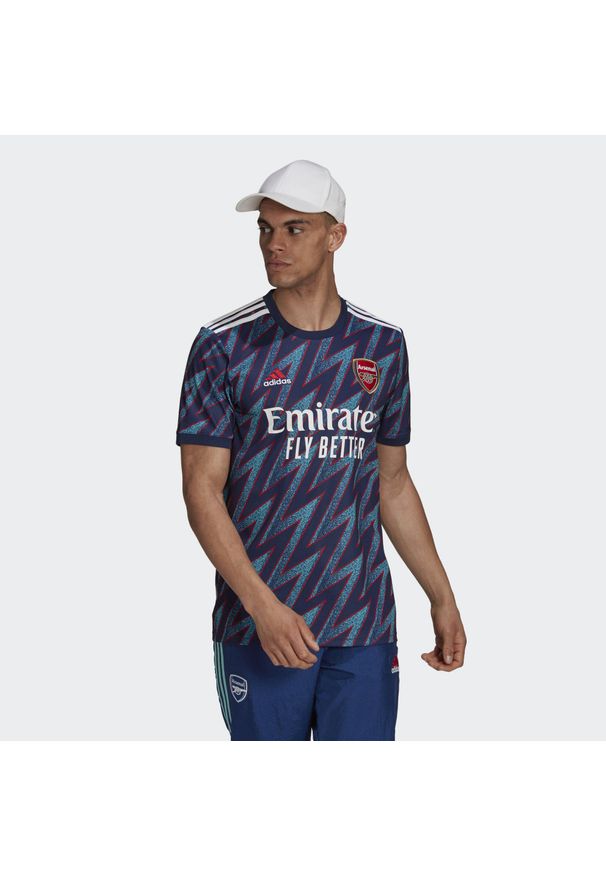 Adidas - Trzecia koszulka Arsenal 2021/22. Kolor: niebieski. Sport: piłka nożna