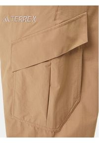 Adidas - adidas Spodnie outdoor Terrex Xploric JM7424 Beżowy Loose Fit. Kolor: beżowy. Materiał: syntetyk. Sport: outdoor #5