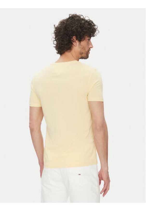 Tommy Jeans T-Shirt DM0DM20363 Żółty Slim Fit. Kolor: żółty. Materiał: bawełna, syntetyk