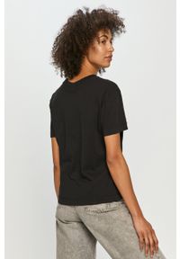 Quiksilver T-shirt damski kolor czarny. Okazja: na co dzień. Kolor: czarny. Materiał: bawełna. Wzór: aplikacja. Styl: casual