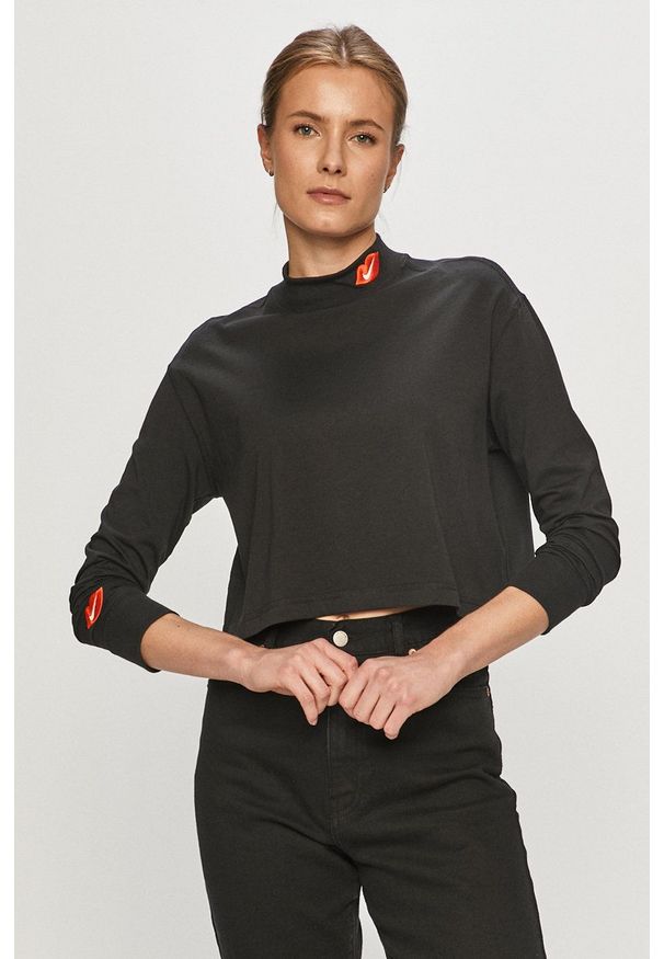 Nike Sportswear - Longsleeve. Kolor: czarny. Materiał: dzianina. Długość rękawa: długi rękaw. Wzór: nadruk