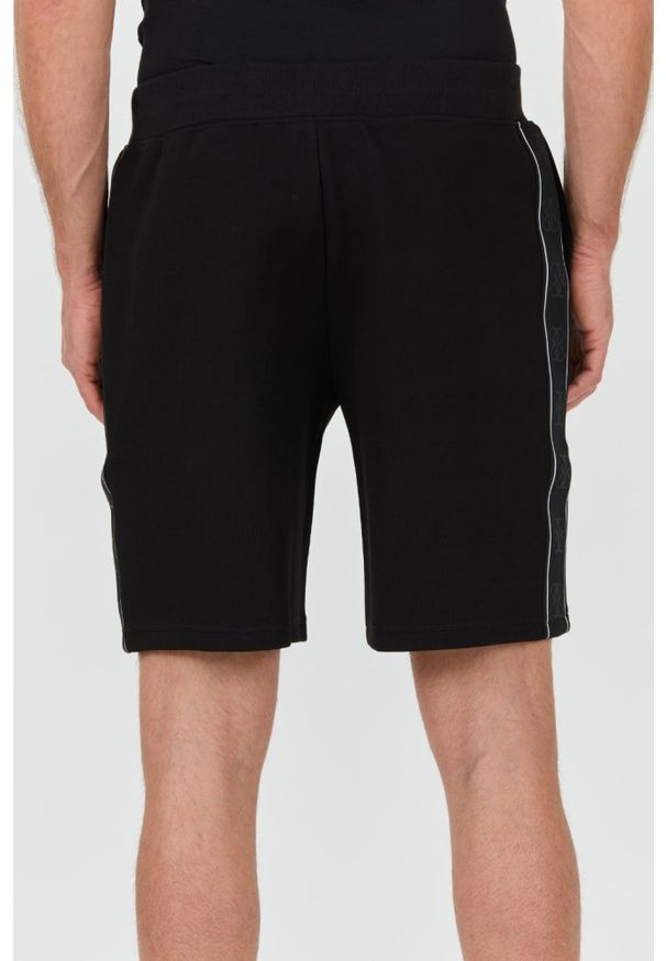 Guess - GUESS Czarne spodenki Mickey Short. Kolor: czarny