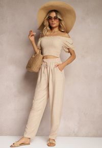 Renee - Beżowe Spodnie z Troczkiem w Pasie i Kieszeniami Ufalia. Okazja: na co dzień. Kolor: beżowy. Materiał: materiał. Styl: elegancki, casual