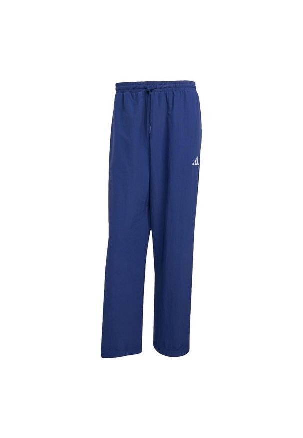 Adidas - Spodnie Essential Small Logo Woven Open Hem. Kolor: biały, wielokolorowy, niebieski. Materiał: tkanina