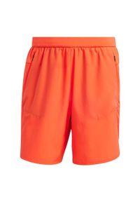 Adidas - Designed for Training Shorts. Kolor: czerwony. Sport: fitness