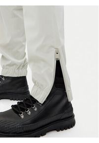 Rains Spodnie przeciwdeszczowe Unisex 18560 Beżowy Regular Fit. Kolor: beżowy. Materiał: syntetyk #4