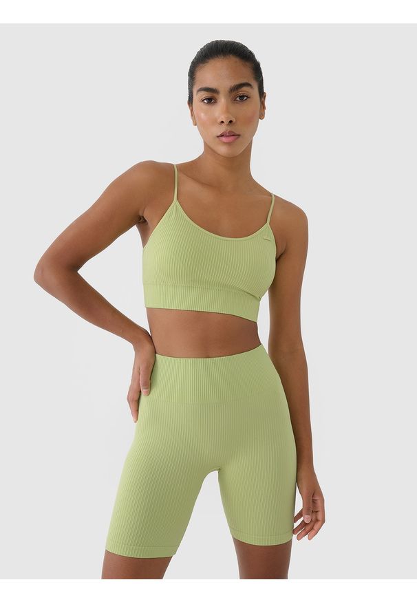 4f - 4F Biustonosz treningowy bezszwowy z niskim wsparciem damski - zielony XS/S. Kolor: zielony. Materiał: guma, elastan, prążkowany, materiał, włókno, dzianina, syntetyk. Rodzaj stanika: wyciągane miseczki. Wzór: ze splotem, jednolity. Sport: fitness, joga i pilates