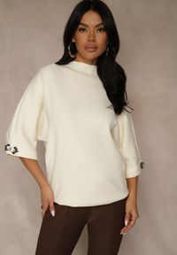 Renee - Jasnobeżowy Sweter z Cyrkoniami przy Rękawach Corentusa. Okazja: na co dzień. Kolor: beżowy. Materiał: jeans. Wzór: aplikacja. Styl: casual, elegancki #1