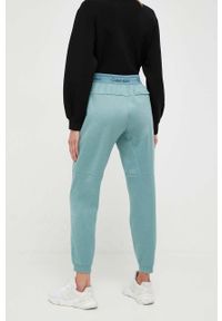 Calvin Klein Performance spodnie treningowe kolor zielony melanżowe. Stan: podwyższony. Kolor: zielony. Wzór: melanż #3