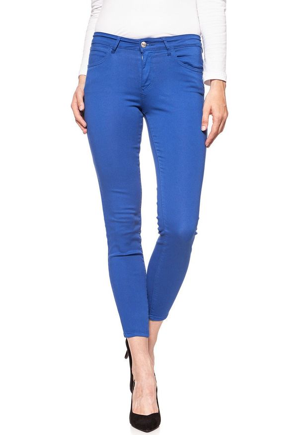Wrangler - SPODNIE WRANGLER DAMSKIE SKINNY CROP TURKISH SEA W28MHL291 112128460. Materiał: materiał