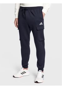 Adidas - adidas Spodnie dresowe Essentials HL2232 Granatowy Regular Fit. Kolor: niebieski. Materiał: syntetyk, bawełna