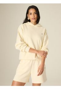 4f - 4F Bluza dresowa loose z kapturem damska - żółta S. Okazja: na co dzień, na spacer. Typ kołnierza: kaptur. Kolor: żółty. Materiał: dresówka. Styl: sportowy, casual #1