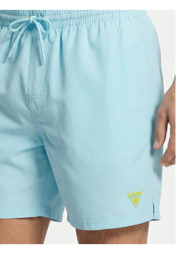 Guess Szorty kąpielowe F6GT24 WG282 MEDIUM Niebieski Regular Fit. Kolor: niebieski. Materiał: syntetyk