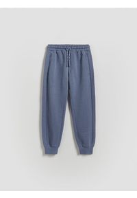 Reserved - Bawełniane joggery - niebieski. Kolor: niebieski. Materiał: bawełna #1