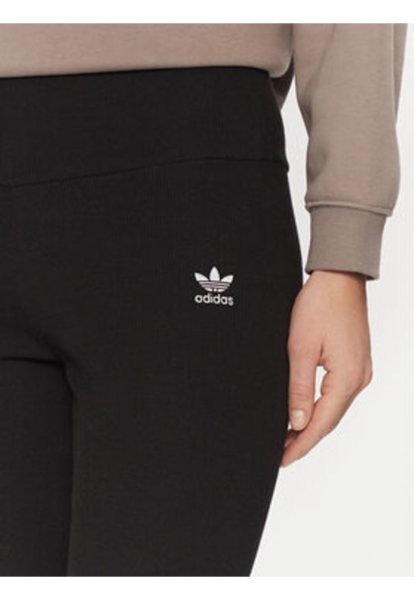 Adidas - adidas Legginsy Essentials IY9645 Czarny Slim Fit. Kolor: czarny. Materiał: wiskoza