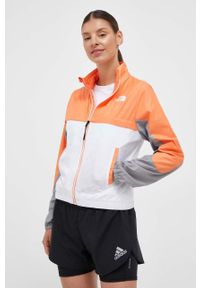 The North Face wiatrówka Mountain Athletics kolor pomarańczowy. Kolor: pomarańczowy. Materiał: materiał #1