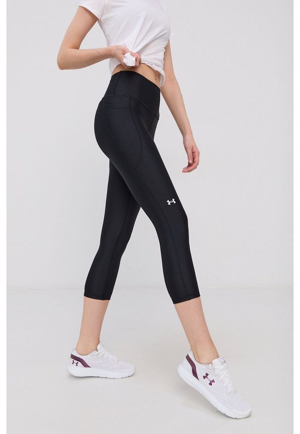 Under Armour - Legginsy. Kolor: czarny. Materiał: dzianina. Wzór: gładki