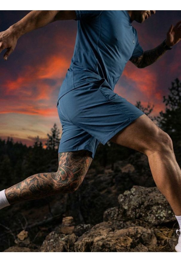 Sinsay - Szorty sportowe SNSY PERFORMANCE - niebieski. Kolor: niebieski. Styl: sportowy