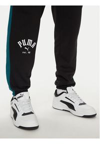 Puma Spodnie dresowe T7 PLAY.PARIS 626768 01 Czarny Regular Fit. Kolor: czarny. Materiał: materiał, bawełna