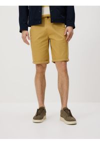 Reserved - Bawełniane szorty chino - bursztynowy. Kolor: pomarańczowy. Materiał: bawełna #1