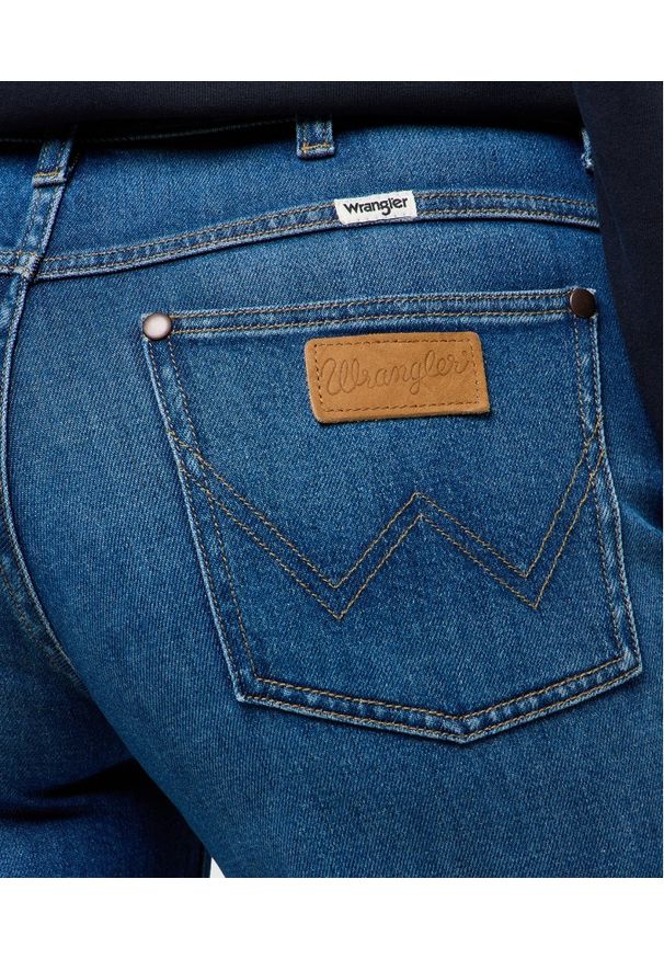 Wrangler - DAMSKIE SPODNIE WRANGLER WORLD WIDE MID STONE 112373000