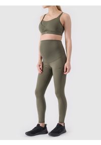 4f - Legginsy ciążowe treningowe szybkoschnące damskie - khaki. Stan: podwyższony. Kolekcja: moda ciążowa. Kolor: oliwkowy, brązowy, wielokolorowy. Materiał: syntetyk, materiał, elastan, włókno, dzianina. Długość: do kostek. Wzór: jednolity, gładki, ze splotem. Sport: fitness