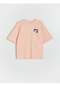 Reserved - T-shirt oversize z nadrukiem - brzoskwiniowy. Kolor: pomarańczowy. Materiał: dzianina, bawełna. Wzór: nadruk