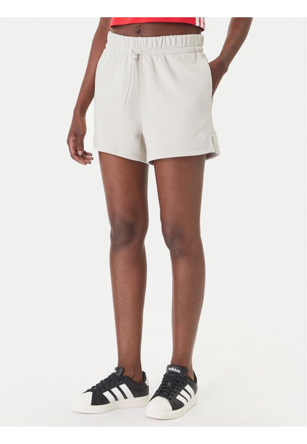 Adidas - adidas Szorty sportowe Essentials Small Logo Feel Cozy JC5931 Beżowy Regular Fit. Kolor: beżowy. Materiał: bawełna