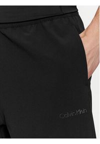 Calvin Klein Performance Spodnie dresowe 00GMS4P633 Czarny Regular Fit. Kolor: czarny. Materiał: syntetyk