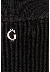 Guess top damski kolor czarny z półgolfem. Typ kołnierza: dekolt halter. Kolor: czarny. Materiał: materiał, dzianina, wiskoza. Wzór: gładki #5
