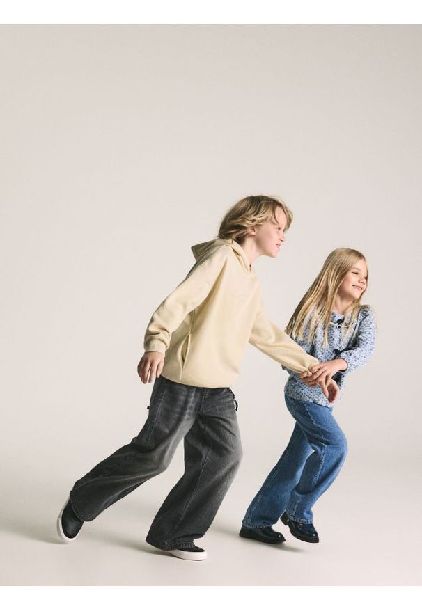 Reserved - Jeansy baggy - czarny. Kolor: czarny