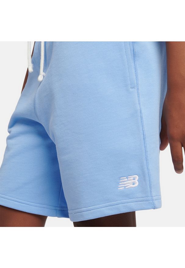 Spodenki dziecięce New Balance LAKB0008ELE – niebieskie. Kolor: niebieski. Materiał: bawełna. Styl: sportowy