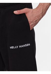 Helly Hansen Spodnie dresowe Core 53926 Czarny Regular Fit. Kolor: czarny. Materiał: bawełna, dresówka #3