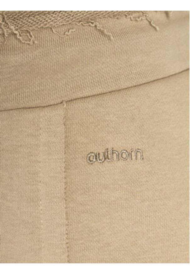 outhorn - Outhorn Spodnie dresowe OTHAW23TTROF478 Beżowy Regular Fit. Kolor: beżowy. Materiał: bawełna