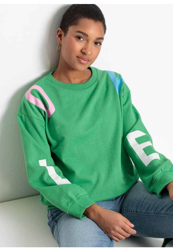 bonprix - Bluza oversize z miękkiej mieszanki z bawełną. Kolor: zielony. Materiał: bawełna. Wzór: nadruk, napisy