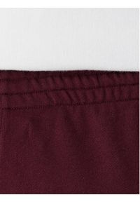 TOMMY HILFIGER - Tommy Hilfiger Spodnie dresowe UW0UW06081 Bordowy Wide Leg. Kolor: czerwony. Materiał: bawełna #5