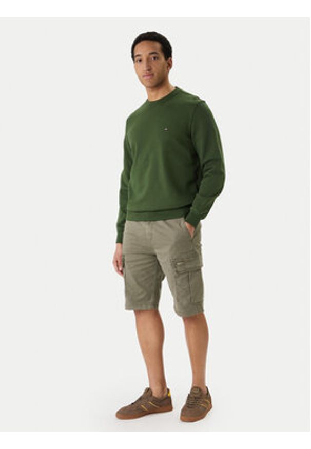 Tommy Jeans Szorty materiałowe Otis DM0DM22831 Zielony Regular Fit. Kolor: zielony. Materiał: bawełna