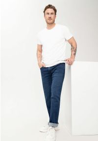 Volcano - Jeansowe spodnie męskie, ciemnoniebieskie, Reguar Fit, D-JERRY 49. Kolekcja: plus size. Kolor: szary, niebieski, wielokolorowy. Wzór: paski