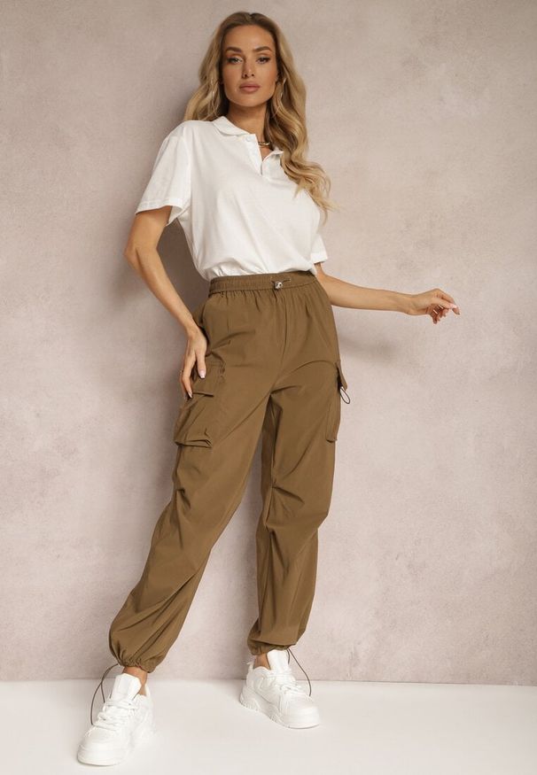 Renee - Brązowe Bojówki Spodnie ze Ściągaczami i Gumką w Talii z Kieszeniami po Bokach Laverina. Kolor: brązowy. Materiał: materiał. Styl: sportowy