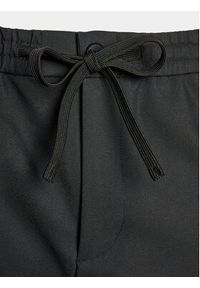 Casual Friday Spodnie materiałowe 20504858 Czarny Slim Fit. Okazja: na co dzień. Kolor: czarny. Materiał: bawełna, materiał. Styl: casual