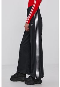 adidas Originals Spodnie H35605 damskie kolor czarny gładkie. Kolor: czarny. Materiał: dzianina, materiał. Wzór: gładki