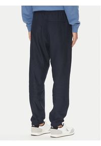 Calvin Klein Jeans Spodnie dresowe Premium LV04RC279G Granatowy Regular Fit. Kolor: niebieski. Materiał: bawełna #5
