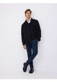 Reserved - Bawełniane spodnie chino slim - granatowy. Kolor: niebieski. Materiał: bawełna #1