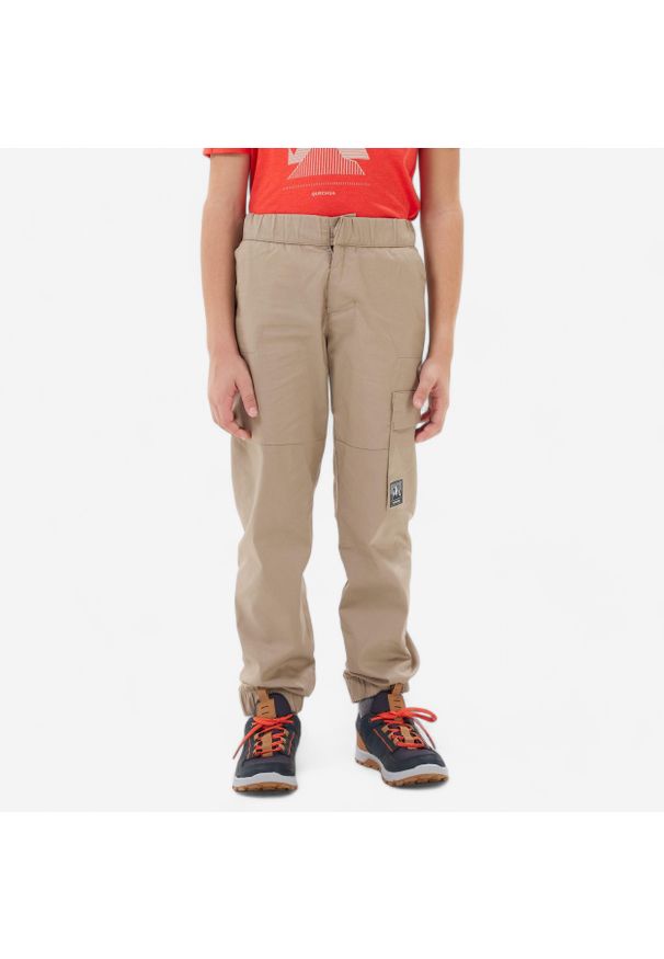 quechua - Spodnie turystyczne dla dzieci Quechua NH100. Kolor: beżowy, wielokolorowy, brązowy. Materiał: poliester, bawełna, materiał. Sezon: lato. Sport: turystyka piesza